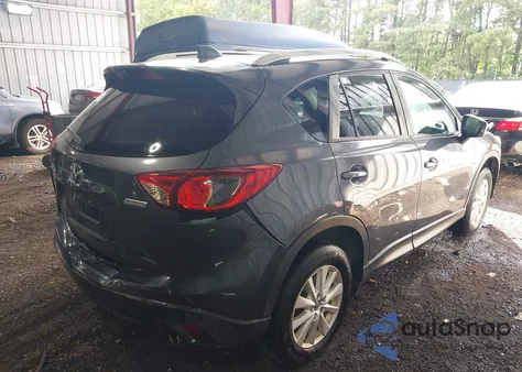 2013 Mazda Cx-5 Touring z USA, uszkodzony, nr VIN JM3KE2CE5D0151507